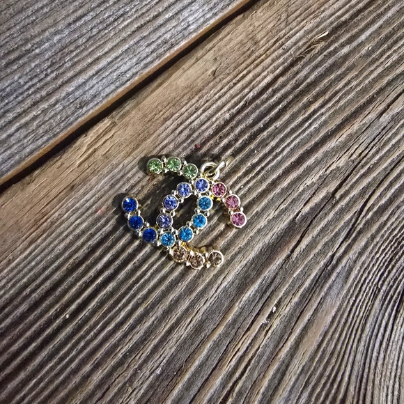 CHANEL Accessories - Euc chanel charm pull multi colored gems cc